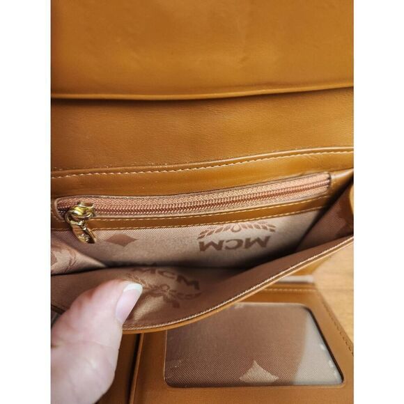 Mcm conganc leather compact wallet  Eight card slots and lots of compartments  E - Picture 5 of 13
